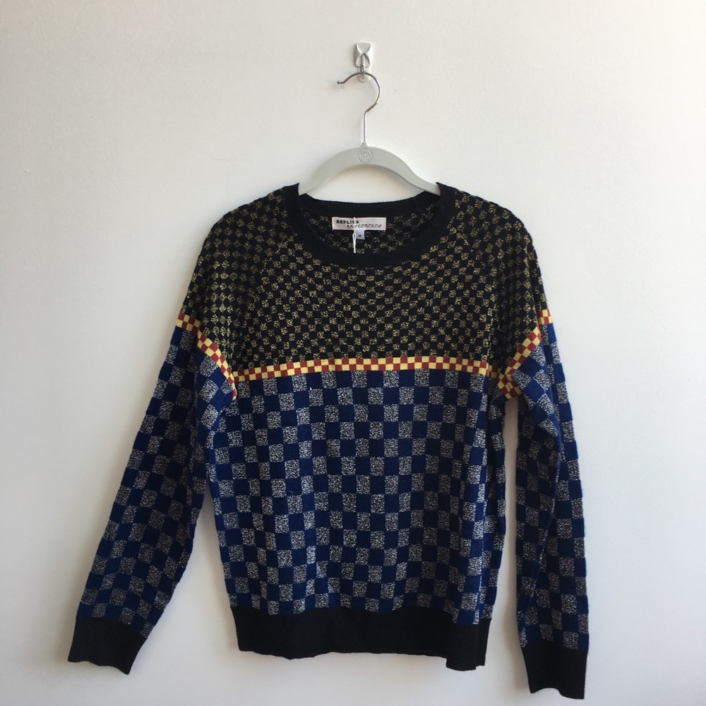 Mixed pattern sweater
